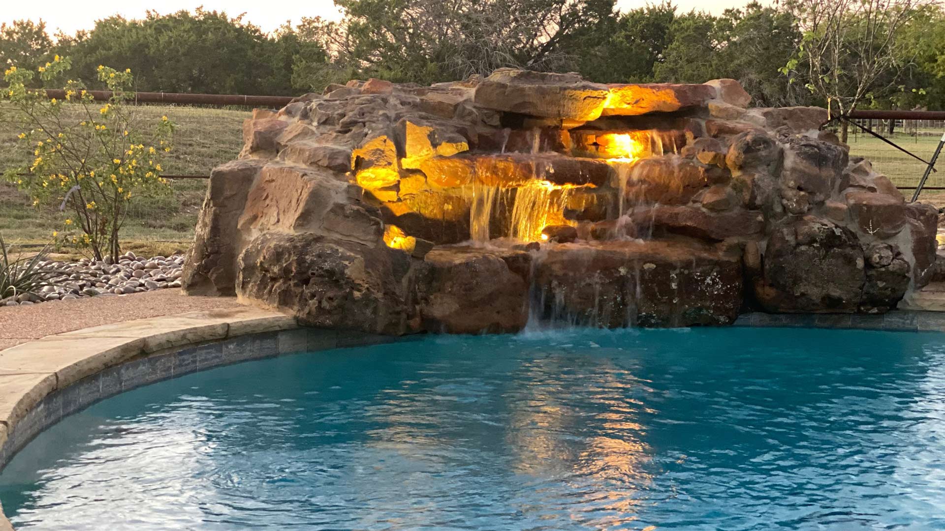Waterfall feature installed for landscape in Woodway, TX.