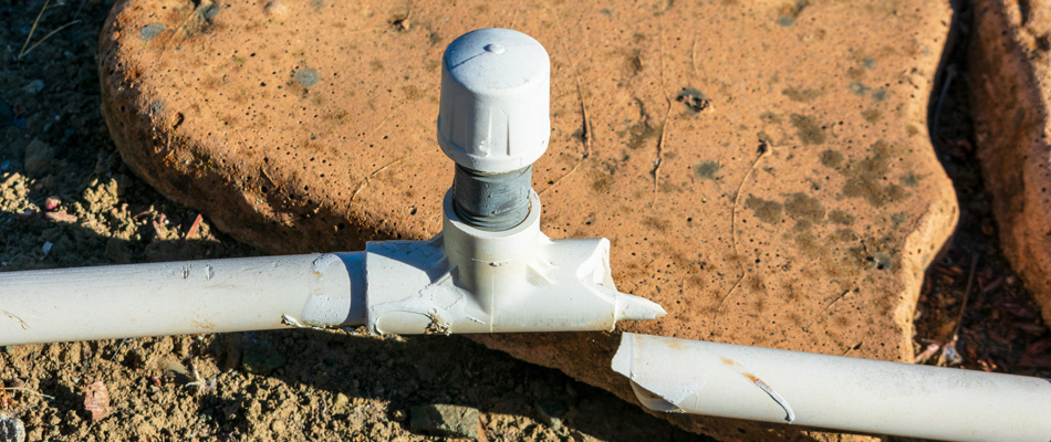 Cracked irrigation pipe needing repair in McGregor, TX.