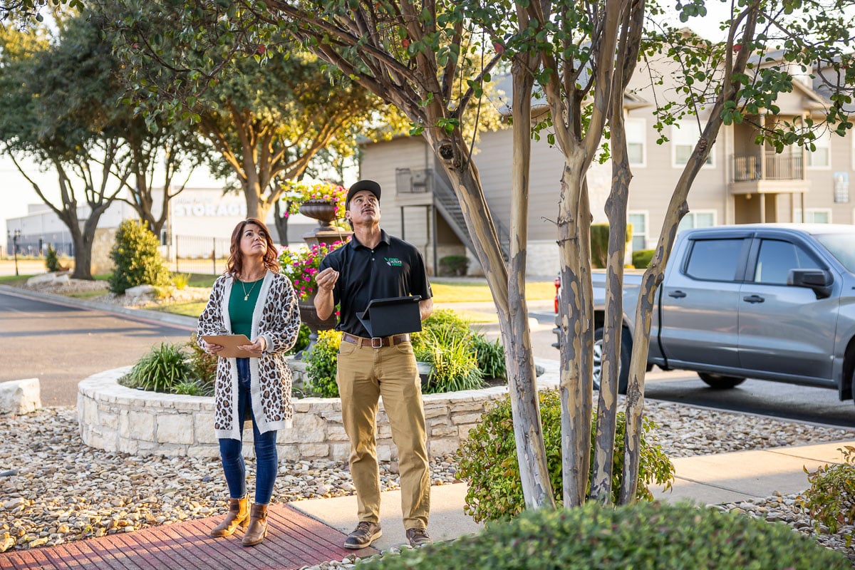 Account manager and property manager walking inspection apartment complex 5