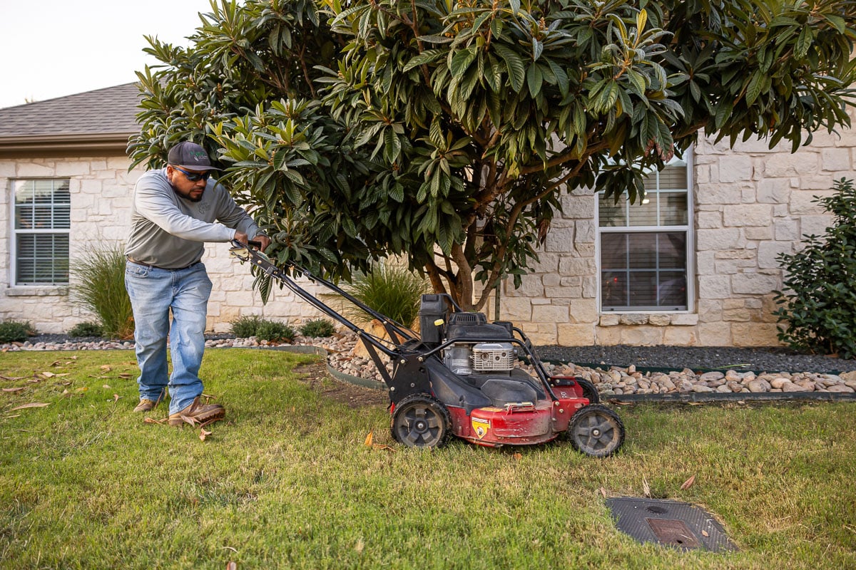 Commercial maintenance apartment complex crew mowing 2