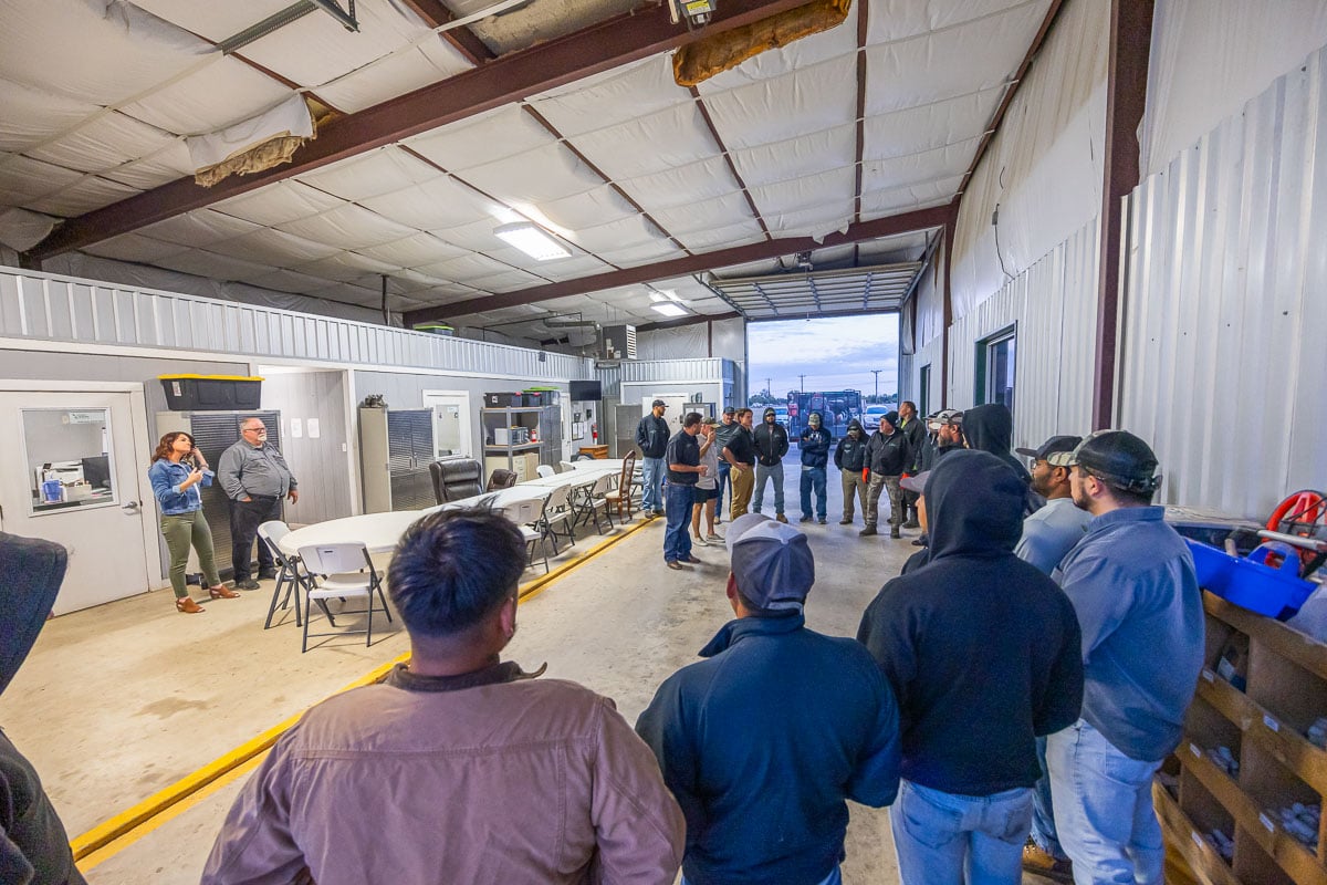 Shop crew in office meeting 2