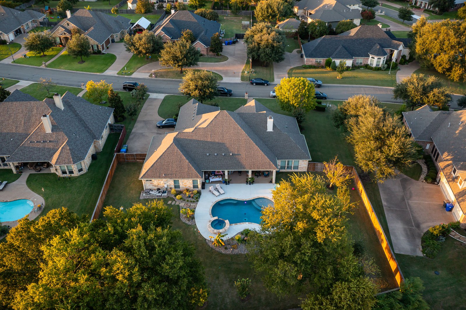 back of house green lawn landscaping aerial view 1