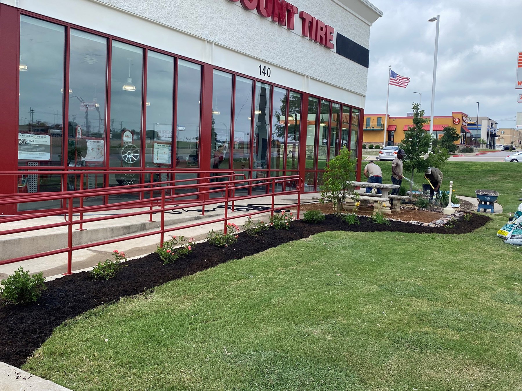 commercial plant mulch beds flowers grass turf