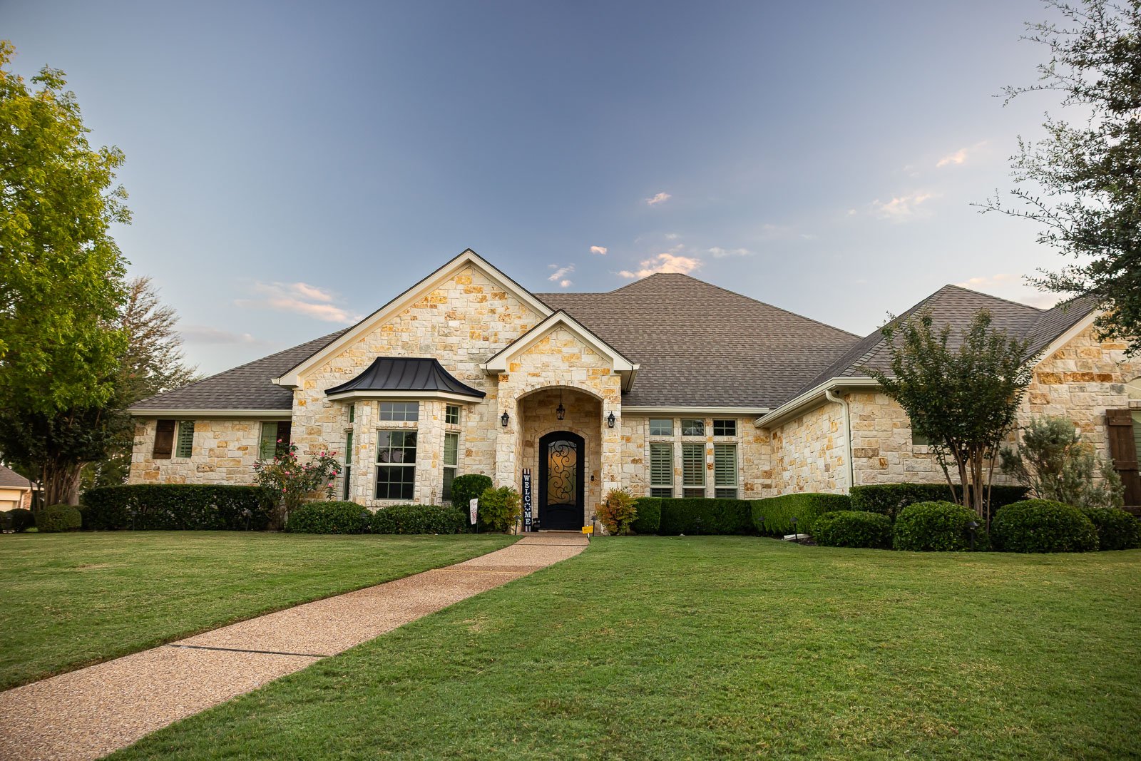 front of house green lawn landscaping beds 2