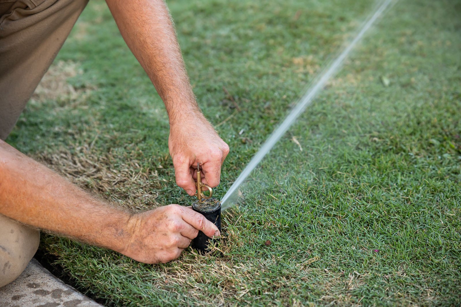 irrigation maintenance crew watering lawn 1