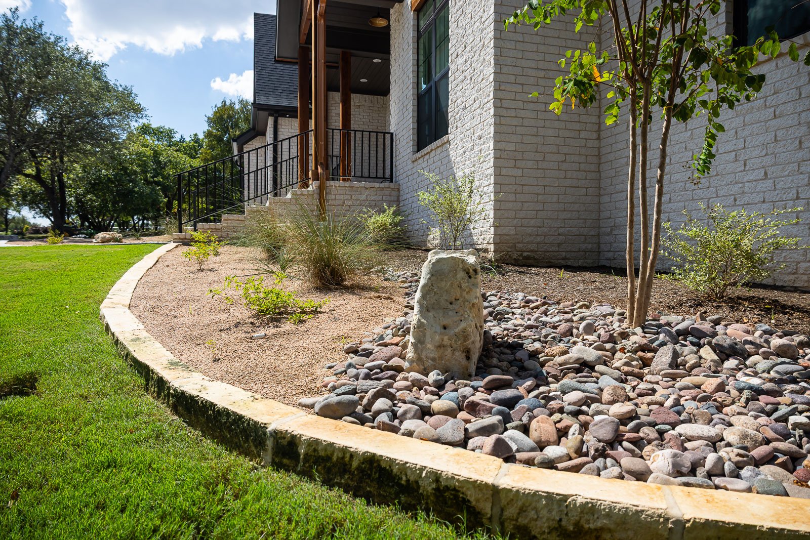 landscape beds along front of house dry bed