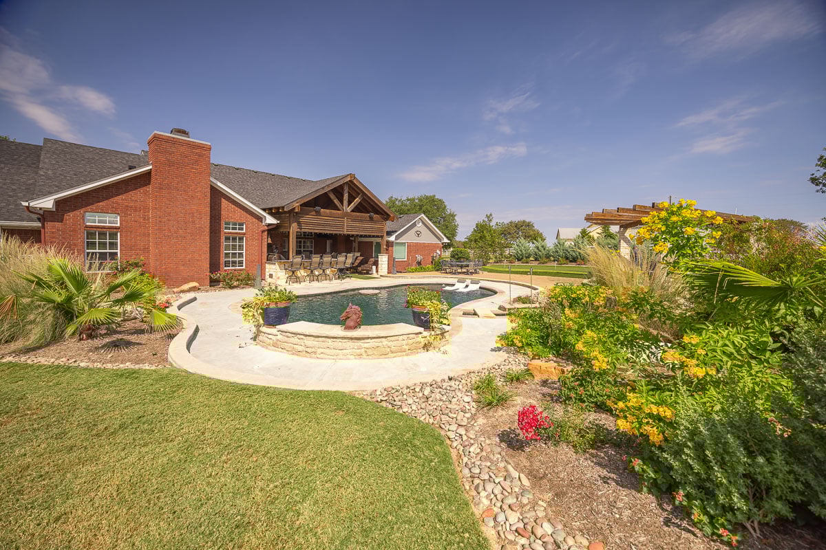landscape design pergola pool patio landscape beds green lawn backyard 