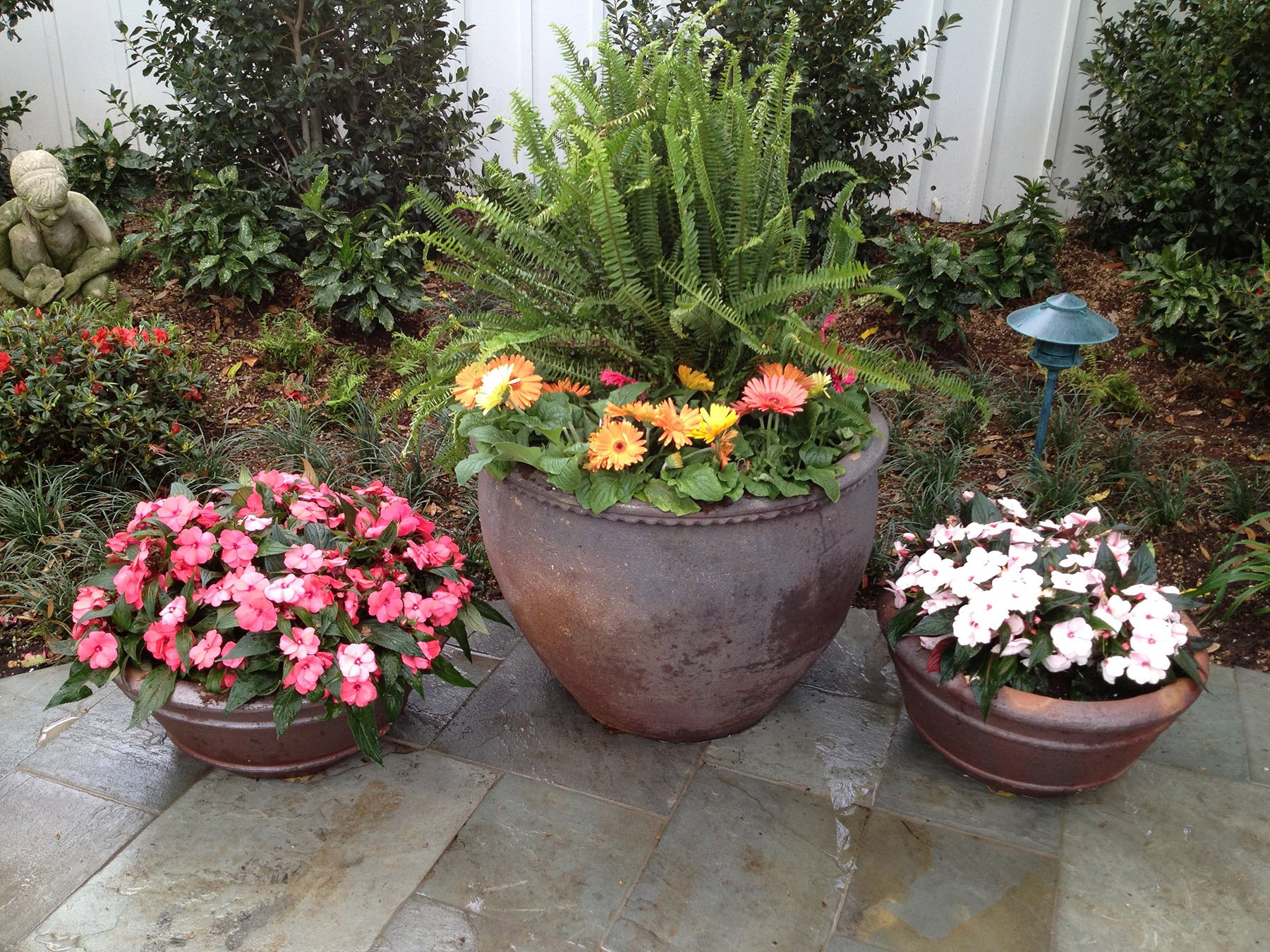 potted flowers annuals stoen patio lighting