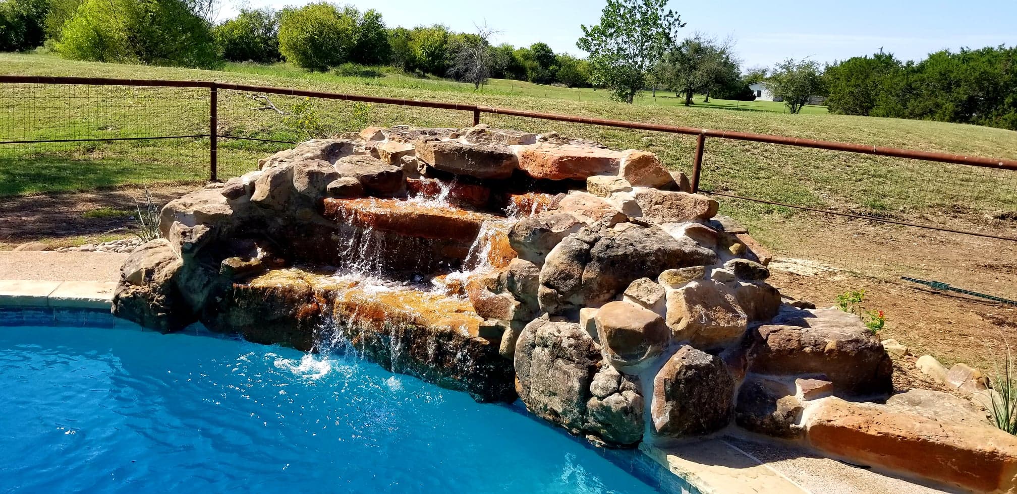 water feature pool stone waterfall