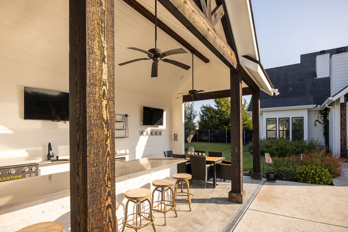 Residential outdoor kitchen patio seating area 