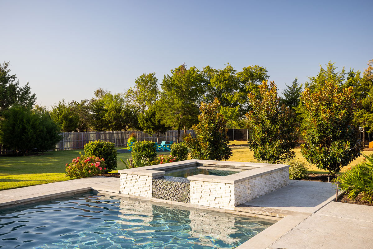 Residnetial landscape pool patio landscape green lawn 