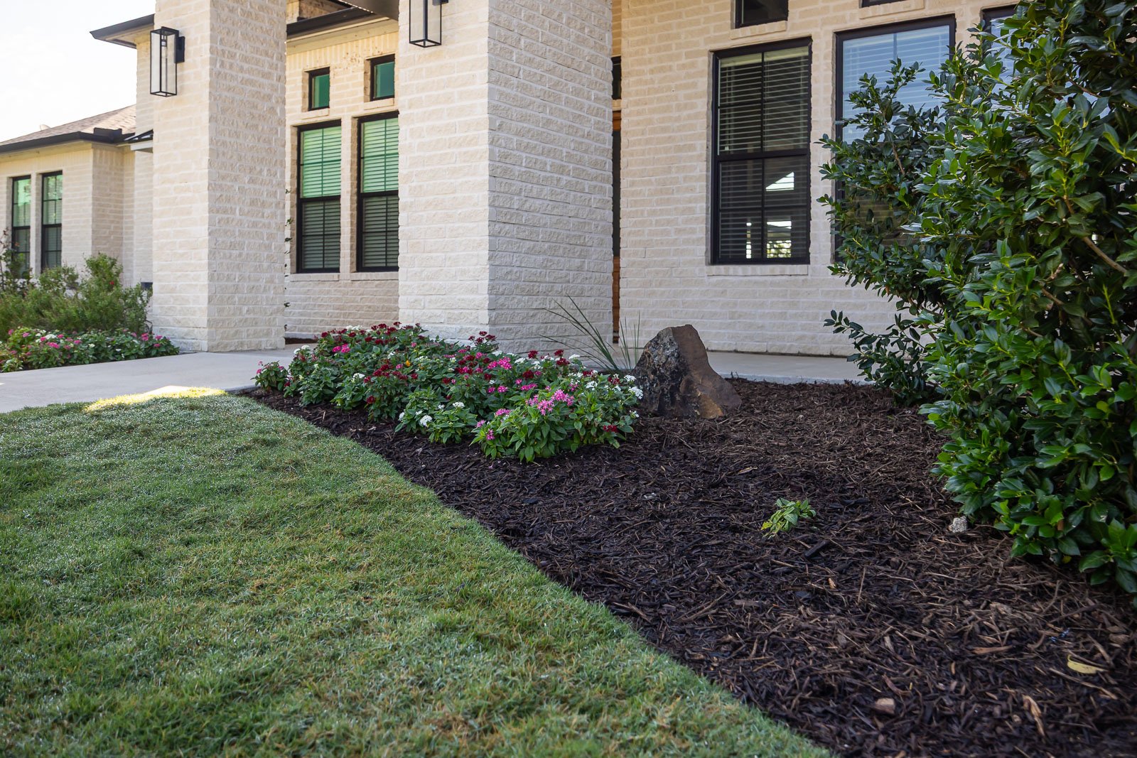 front of house landscape beds green lawn 2