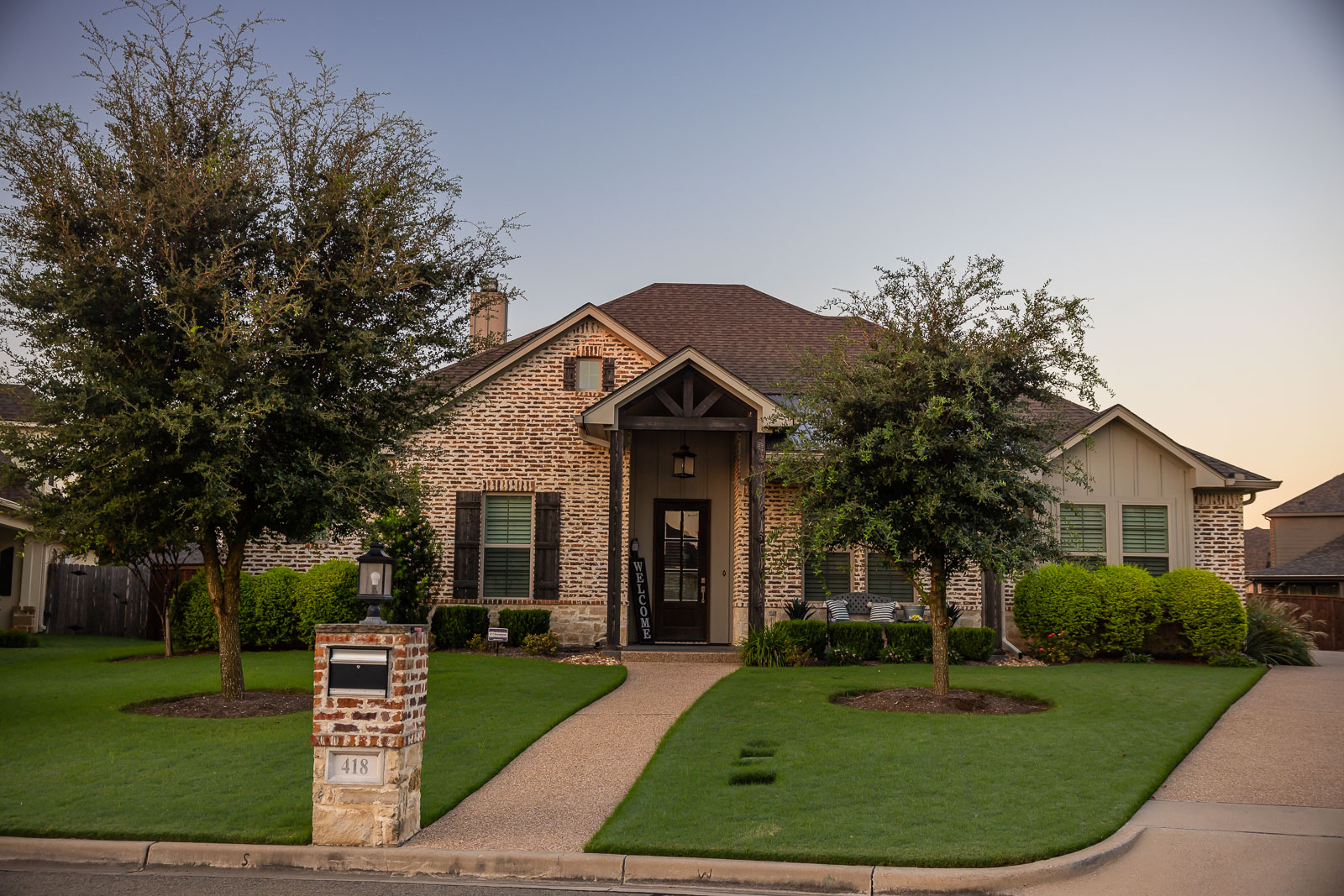 front of house landscaping beds green lawn 1